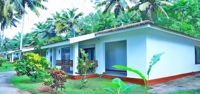 Estuary Sarovar Portico Poovar - Premium Cottage