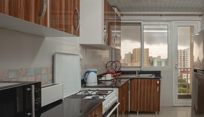 Golden Tulip Dar City Center - SUITE KITCHEN