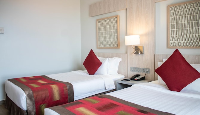 GOLDEN TULIP LE DIPLOMATE COTONOU - Chambres / Logements