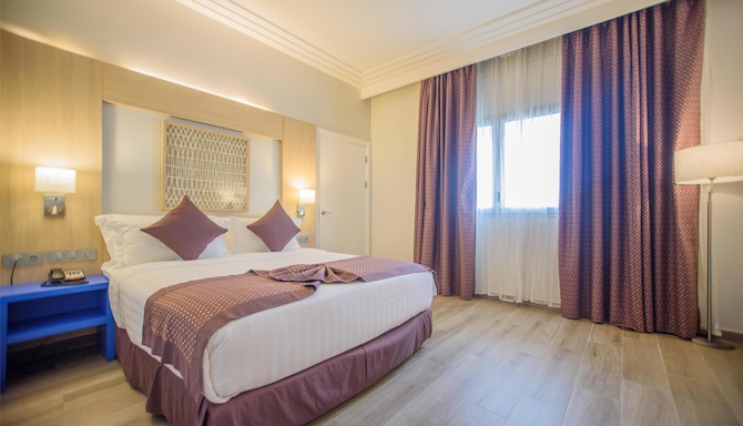 GOLDEN TULIP LE DIPLOMATE COTONOU - Chambres / Logements