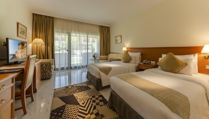 Golden Tulip Nizwa - Chambres / Logements