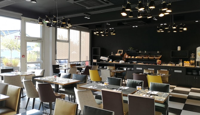 GOLDEN TULIP ROISSY SAINT WITZ - photo salle pdj