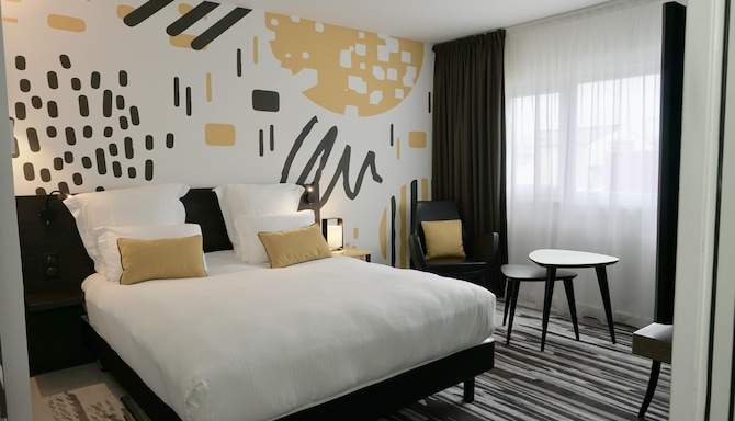 GOLDEN TULIP ROISSY SAINT WITZ
