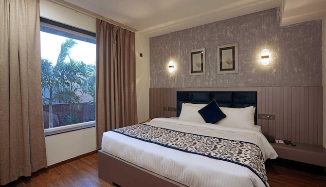 Grand Continent Anjuna A Sarovar Portico Affiliate Hotel - Superior Room Partial Pool View