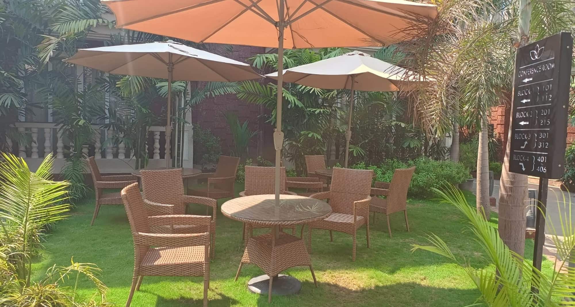 Grand Continent Anjuna A Sarovar Portico Affiliate Hotel - Open Lawn By the Pool