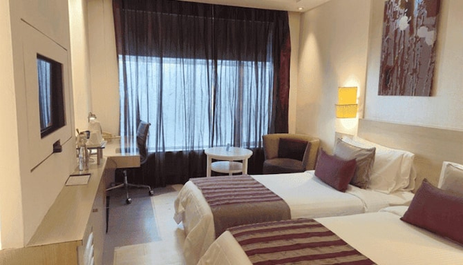 The Ashtan Sarovar Portico Delhi - SUP TWIN ROOM The Ashtan Sarovar Portico Delhi